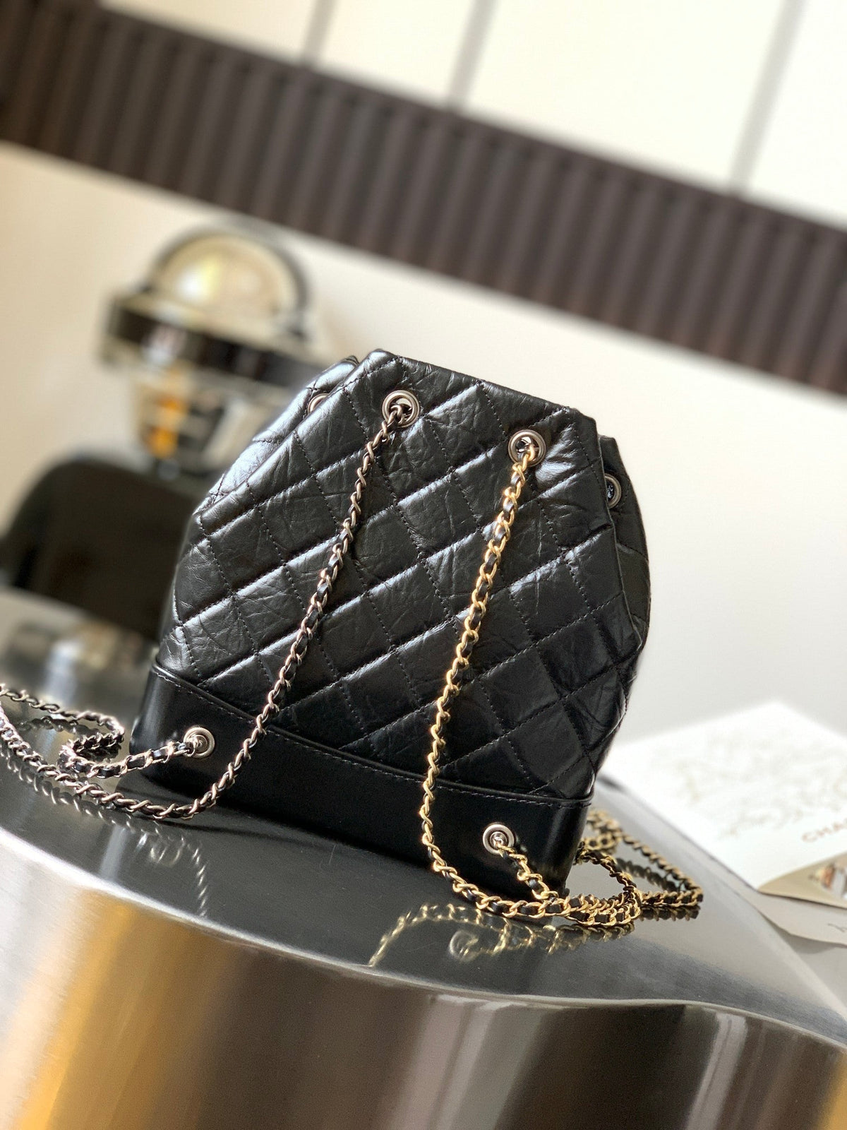 CHANEL 25S GRABRIELLE BACKPACK 24 CM IN BLACK LAMBSKIN