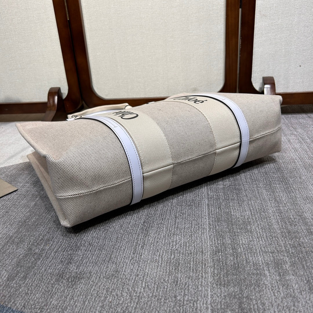 LAGRE WOODY TOTE BAG 45 IN BEIGE LINEN CANVAS BLACK WEBBING LOGO EMBROIDER WHITE CALFSKIN