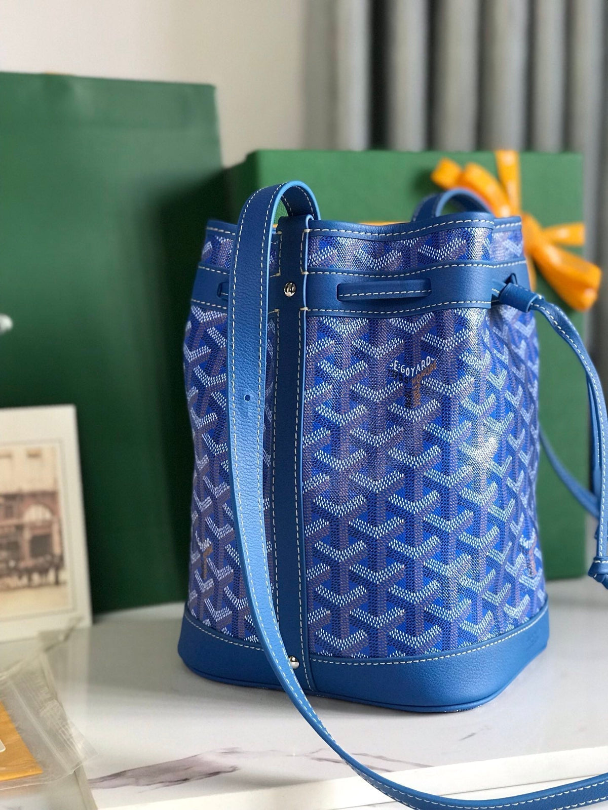 PETIT FLOT BUCKET BAG 22 IN SAPPHIRE BLUE GOYARDINE CANVAS AND LAMBSKIN TRIM