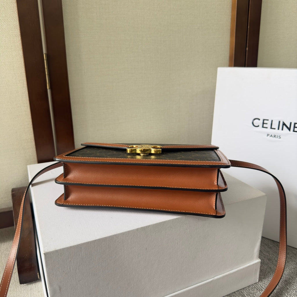 CELINE 25S WALLET MARGO 22MM IN BLACK TRIOMPHE CANVAS AND BROWN CALFSKIN