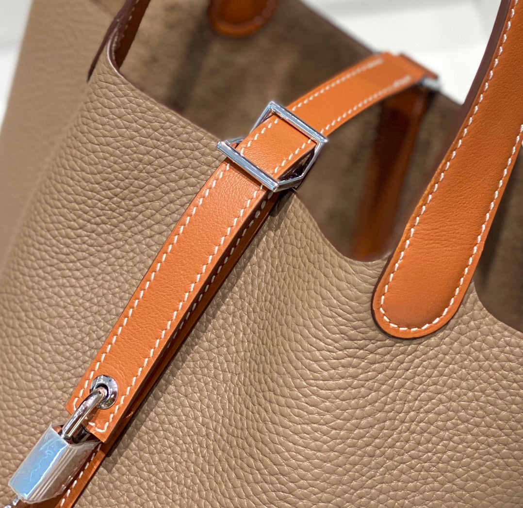 HERMES 25S PICOTIN LOCK 18 IN BURNT ORANGE AND BROWN CALFSKIN SILVER HARDWARE