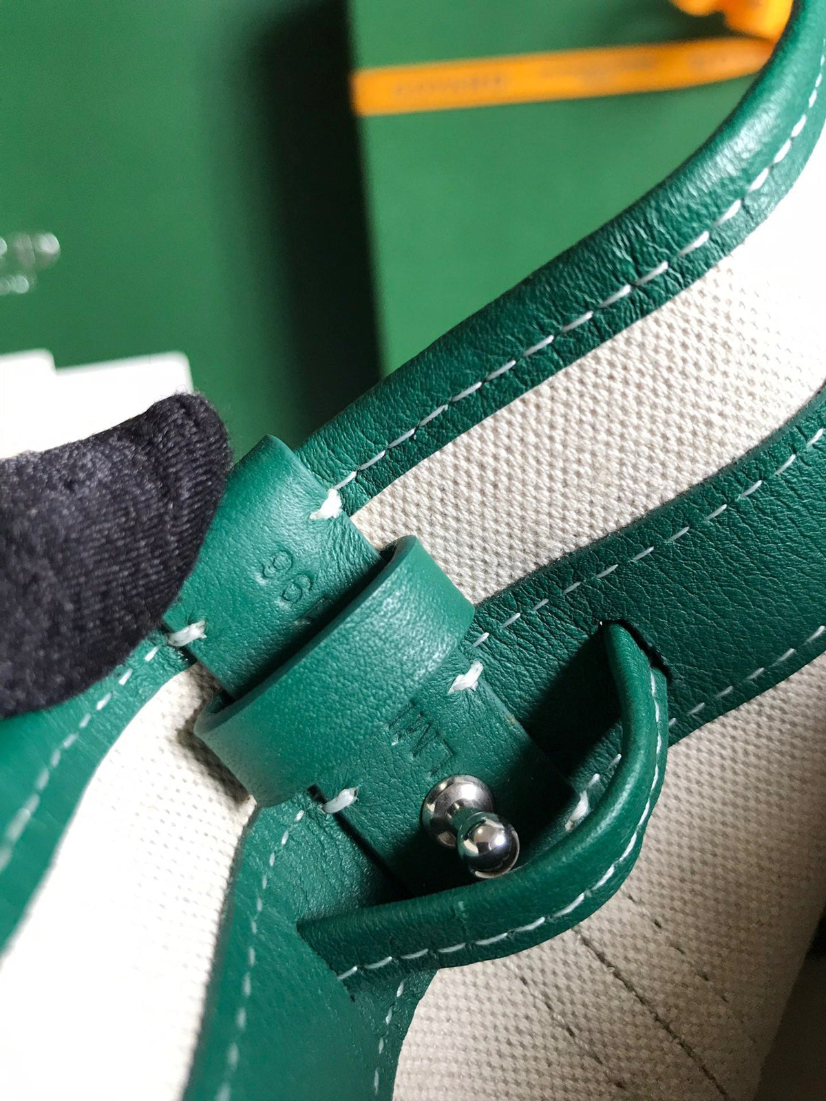 PETIT FLOT BUCKET BAG 22 IN GREEN GOYARDINE CANVAS AND LAMBSKIN TRIM