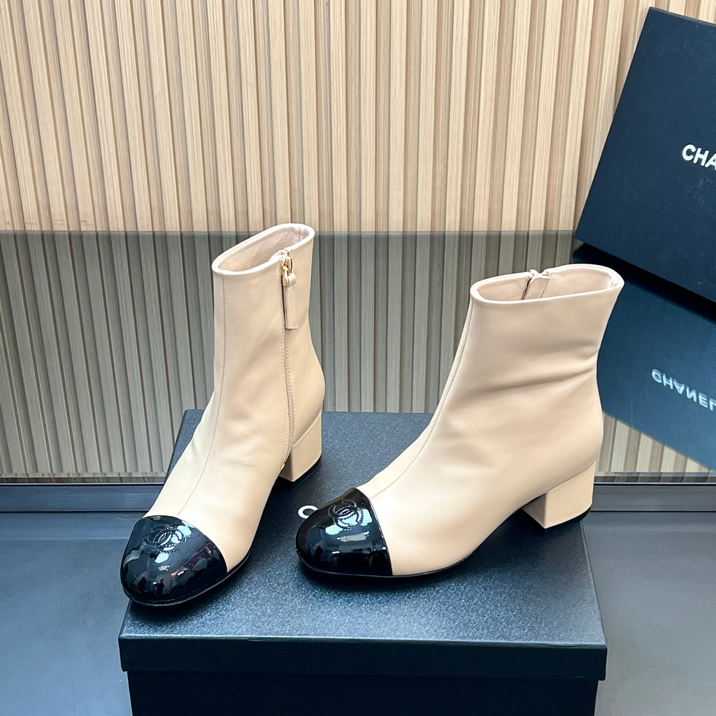 CHANEL 25S BOOTS WITH PATENT TOE CAP 50MM IN BEIGE AND BLACK CALFSKIN