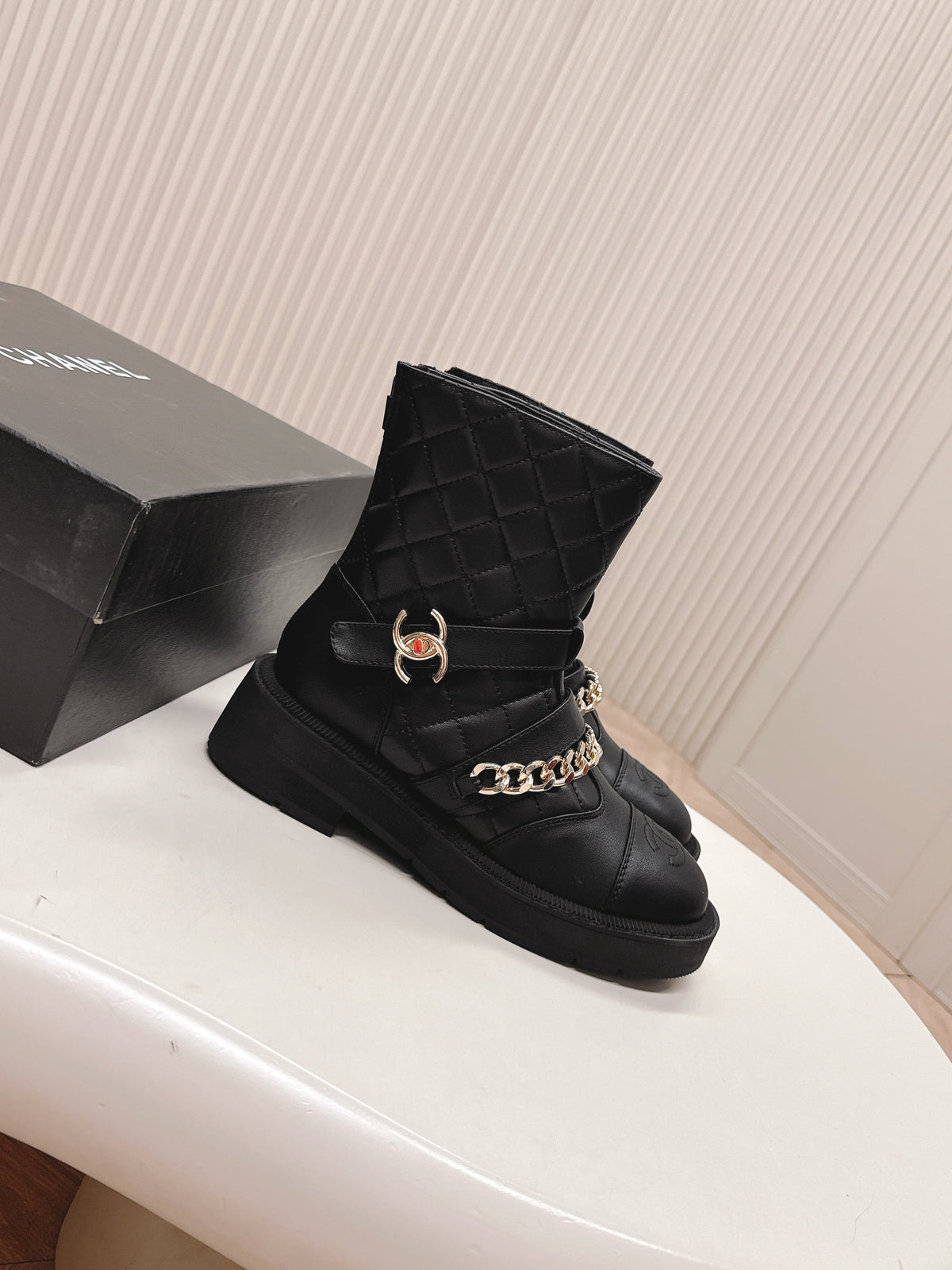 CHANEL ANKLE BOOTS 25S IN BLACK LAMBSKIN EMBOSSED LOGO WITH GOLD HARDWARE