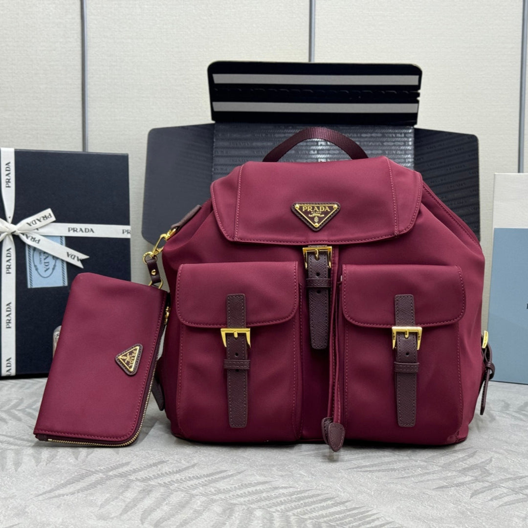 PRADA 25S RE-EDITION 1978 SMALL BACKPACK 32 IN BURGUNDY RE-NYLON