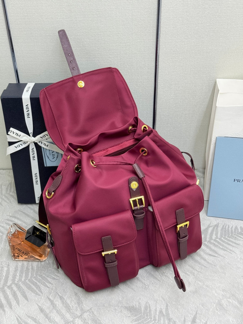 PRADA 25S RE-EDITION 1978 SMALL BACKPACK 32 IN BURGUNDY RE-NYLON