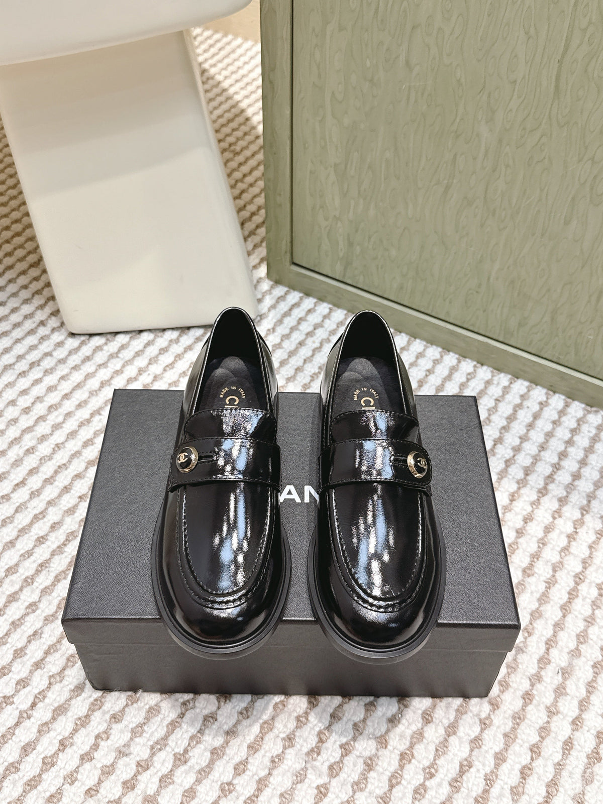 CHANEL 25S GODDESS FLAT LOAFERS IN BLACK PATENT CALFSKIN GOLD HARDWARE