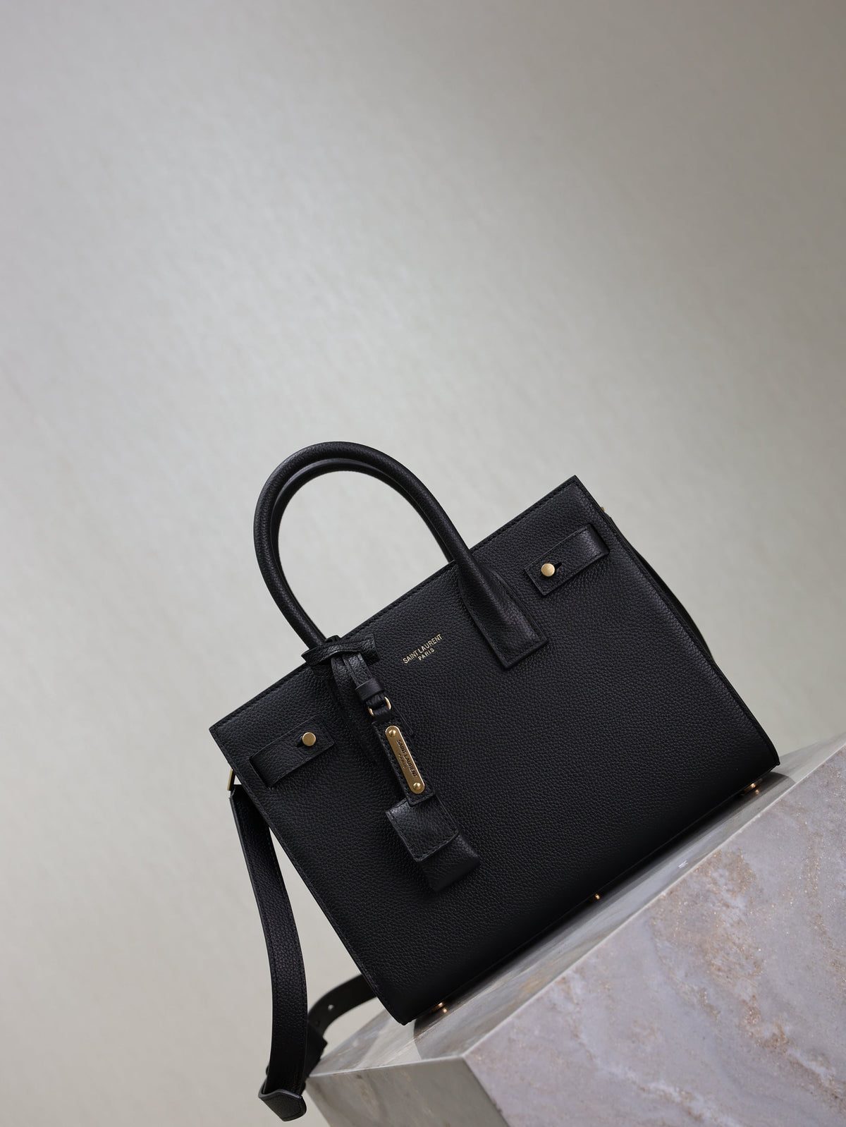 YSL 25S SAC DE JOUR MM 26 IN BLACK SUPPLE GRAINED CALFSKIN GOLD HARDWARE