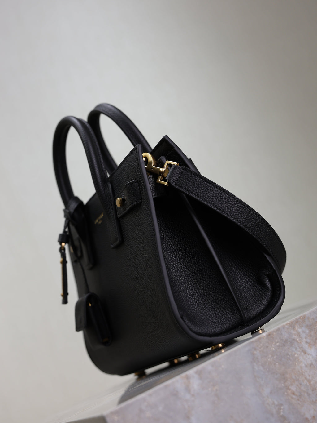 YSL 25S SAC DE JOUR 22 IN BLACK SUPPLE GRAINED CALFSKIN GOLD HARDWARE