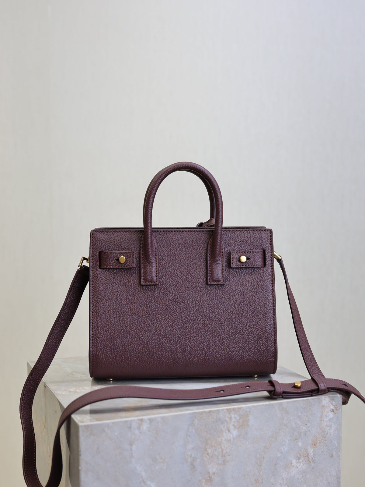 YSL 25S SAC DE JOUR 22 IN ROUGE CABERNET SUPPLE GRAINED CALFSKIN