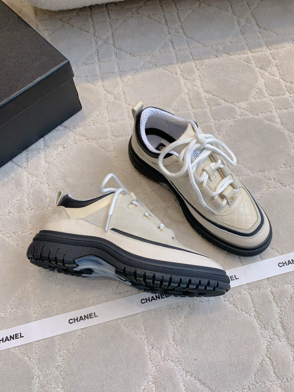 CHANEL 25S TRAINERS 40MM IN WHITE AND BLACK CALFSKIN