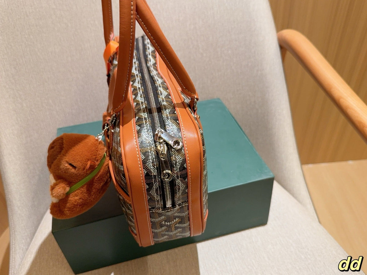SAINT MARTIN BAG 35 IN BROWN GOYARDINE CANVAS AND CALFSKIN