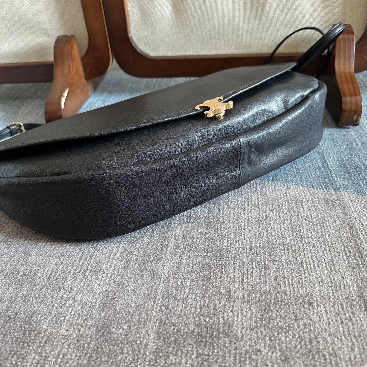 CELINE 25S HALFMOON SOFT TRIOMPHE BAG 46MM IN BLACK SUPPLE SHINY LAMBSKIN
