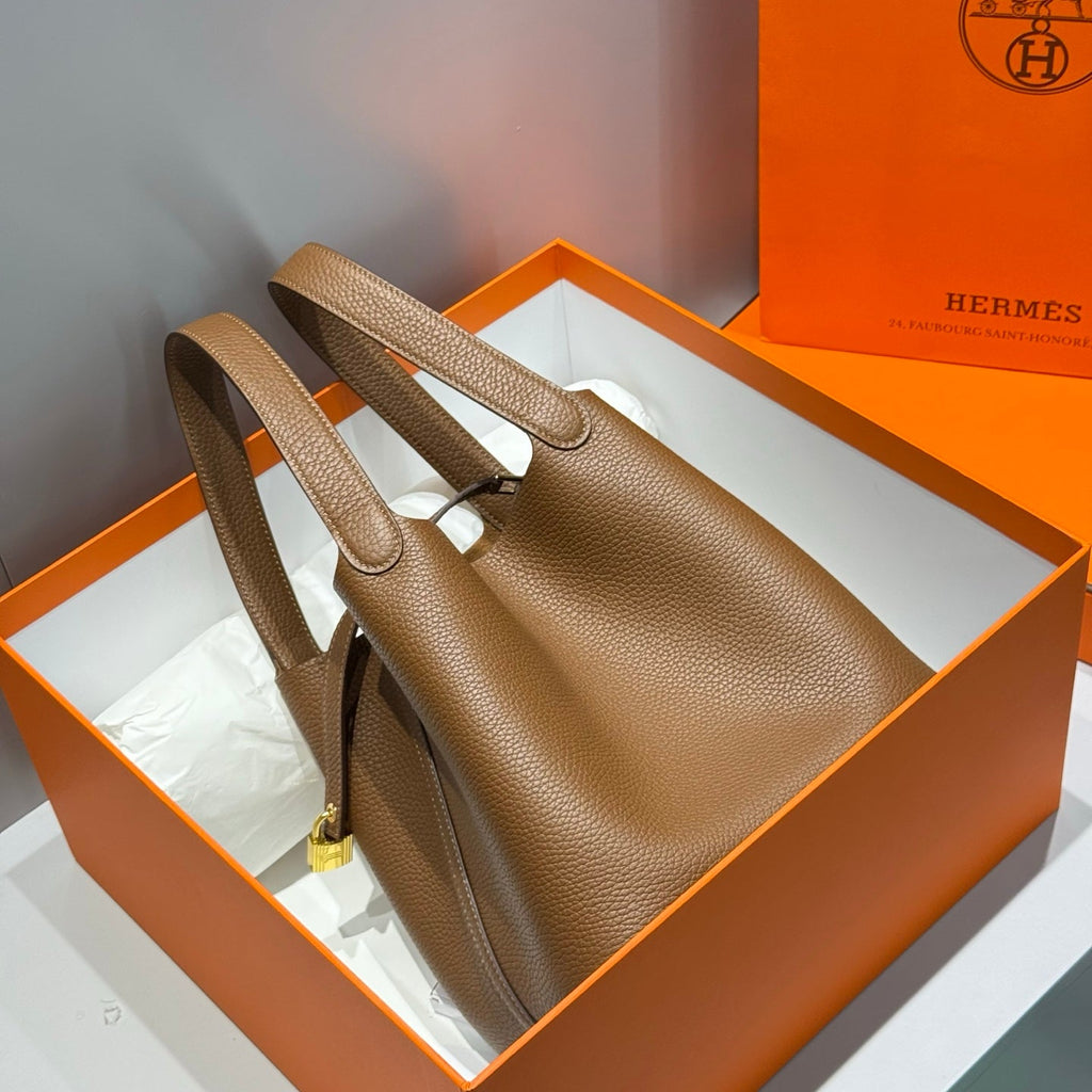HERMES 25S PICOTIN LOCK 22 IN BURNT CARAMEL CALFSKIN GOLD HARDWARE