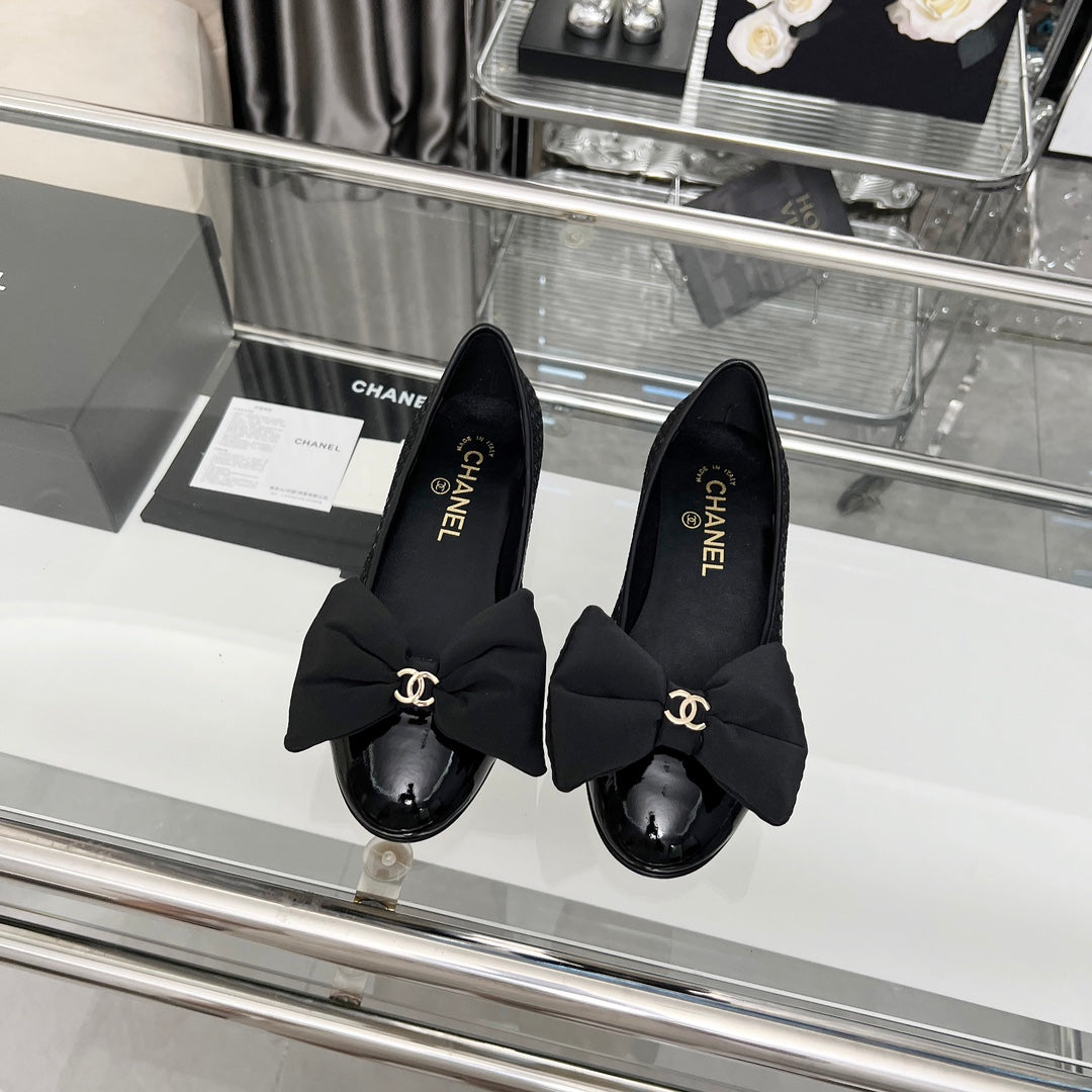 CHANEL 25S ROUND TOE BALLET FLATS WITH A BOW IN SPARKLING BLACK CANVAS