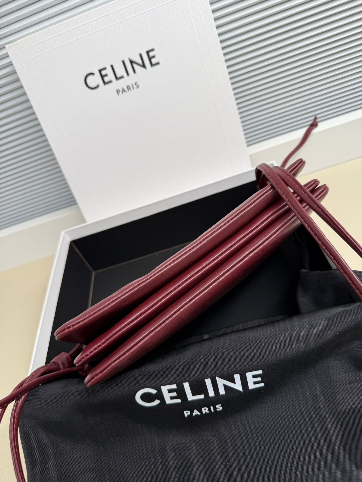 CELINE 25S TRIO FLAP 22MM IN DARK RED SMOOTH LAMBSKIN GOLD HARDWARE