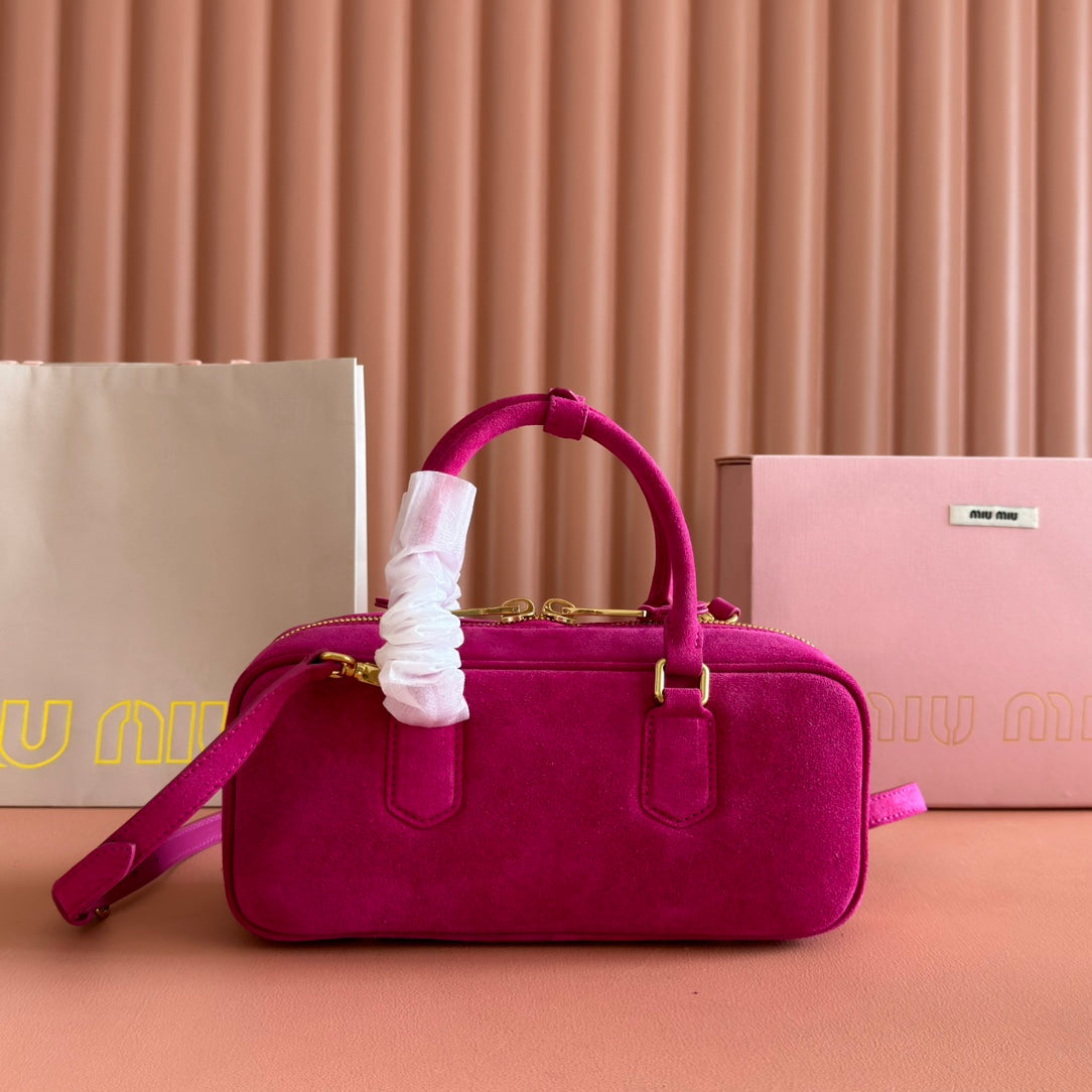 ARCADIE BAG 27 IN FUCHSIA SUEDE GOLD HARDWARE