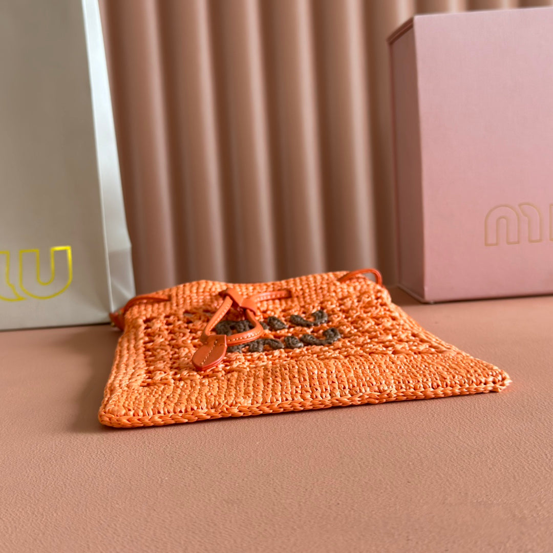 MIUMIU 26S WANDER BUCKET BAG 23 IN ORANGE RAFFIA WITH LEATHER TRIM