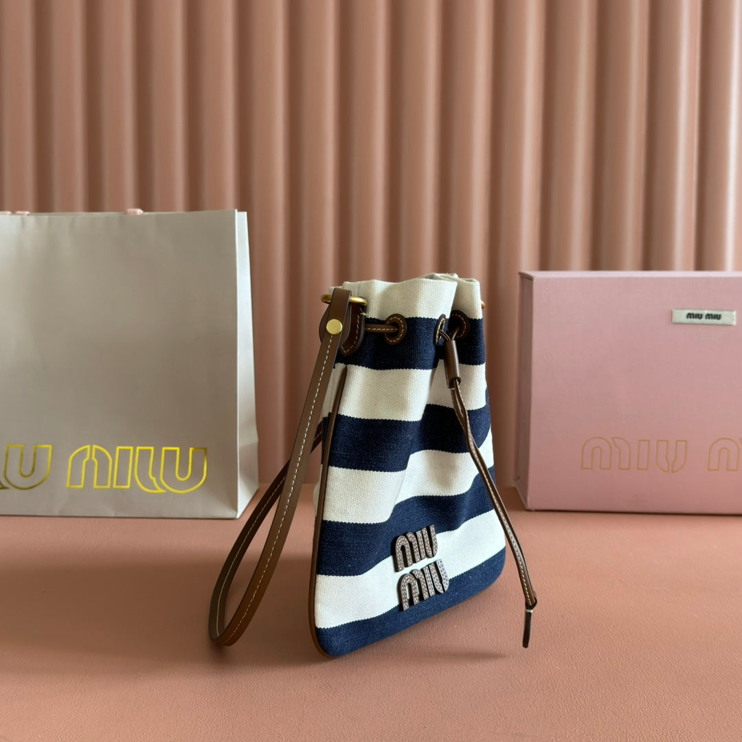 MIUMIU 26S BUCKET BAG 23 IN CREAM AND NAVY BLUE CANVAS GOLD HARDWARE