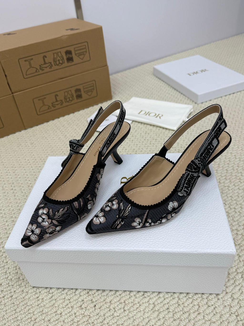 DIOR HIGH SLINGBACK 65 MM 25S IN BLACK FABRIC AND FLORAL PATTERN