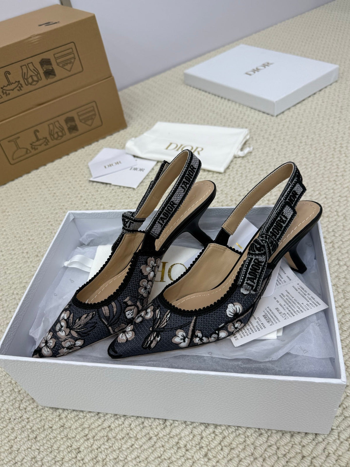 DIOR HIGH SLINGBACK 65 MM 25S IN BLACK FABRIC AND FLORAL PATTERN