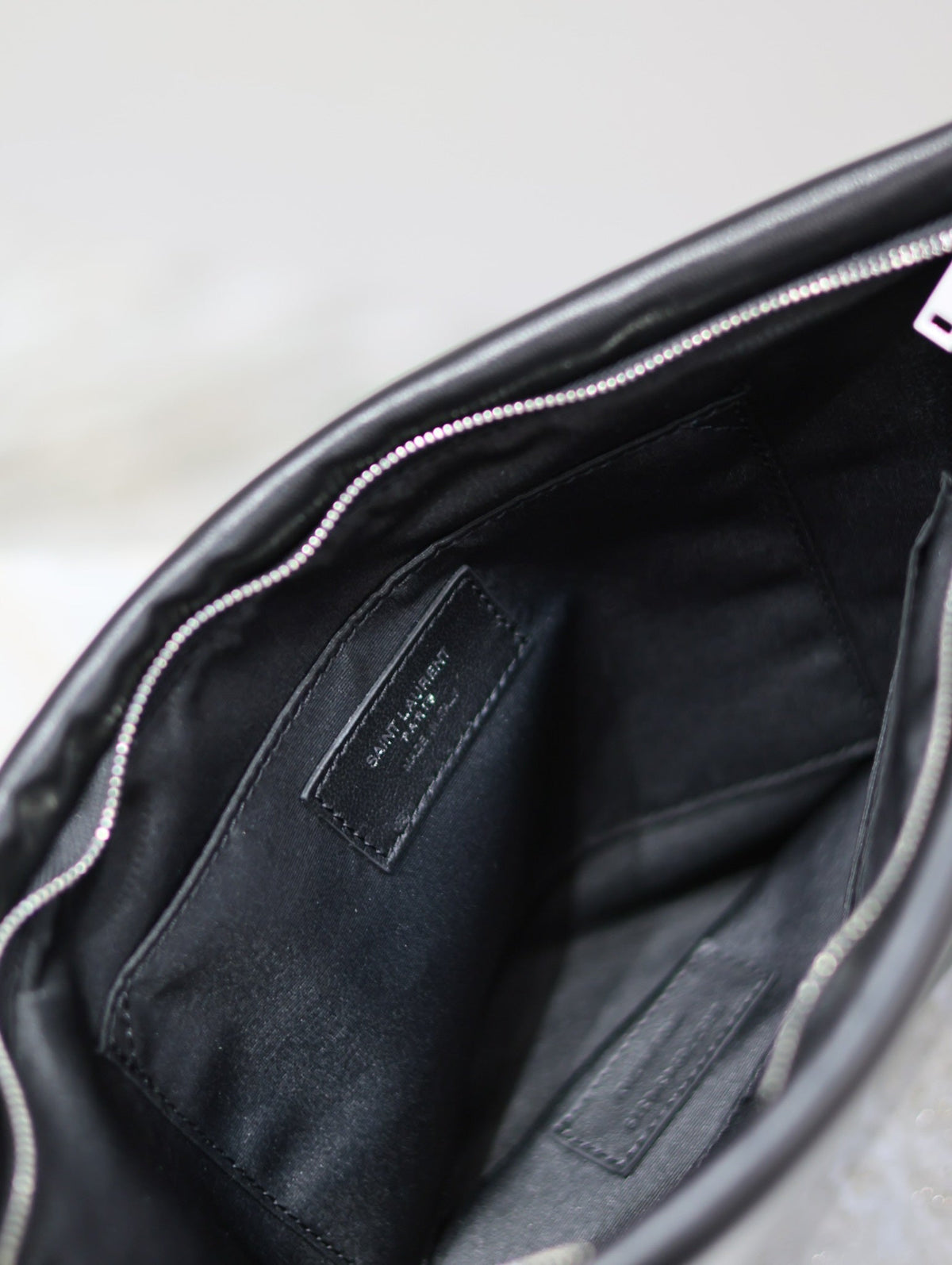 POUCH 30 IN BLACK CALFSKIN WITH EMBOSSED LOGO