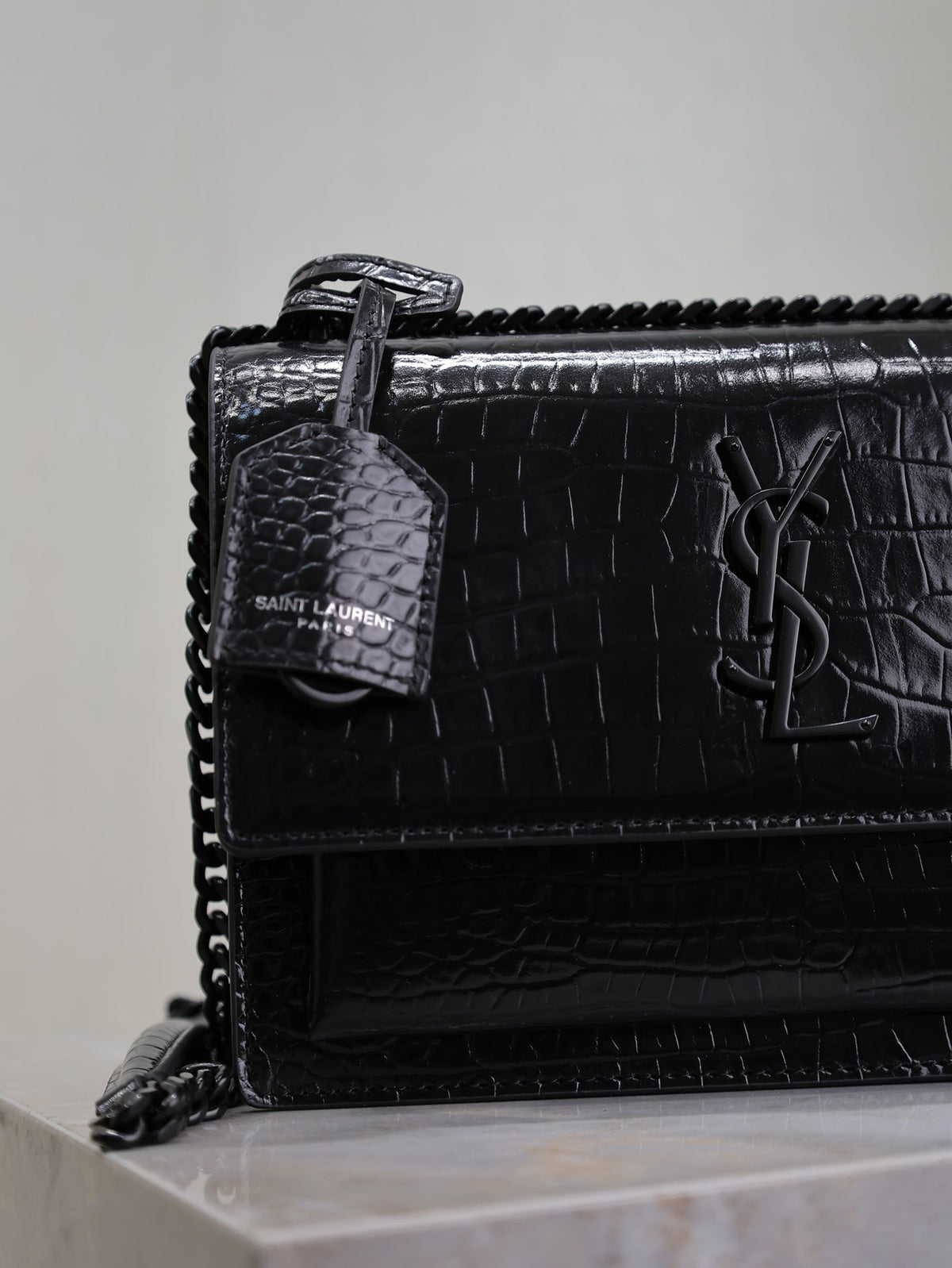 YSL 25S SUNSET MEDIUM 22 IN BLACK CROCODILE-EMBOSSED SHINY CALFSKIN BLACK HARDWARE